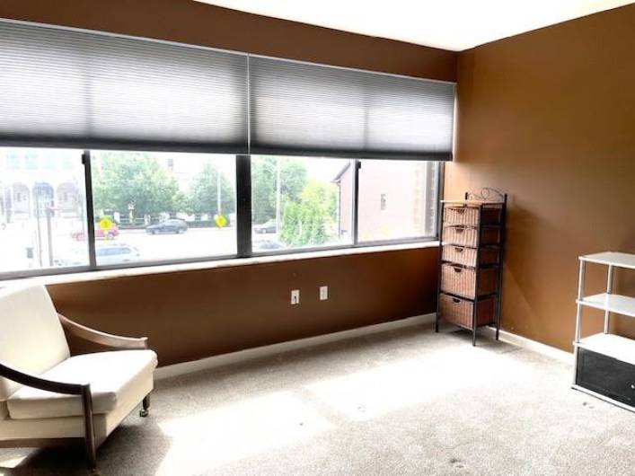 Bedroom #2 with an entire window wall