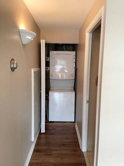 Washer-Dryer is discreetly hindden in a hall closet