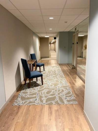 Hallway to elevator and some condos