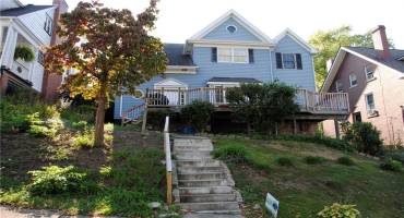 Front of home.  Home has 4 bedrooms and 2 full baths.   Beautiful family room and off street parking.