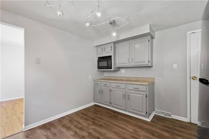 Plenty of cabinet storage and stainless steel appliances in this Kitchen.