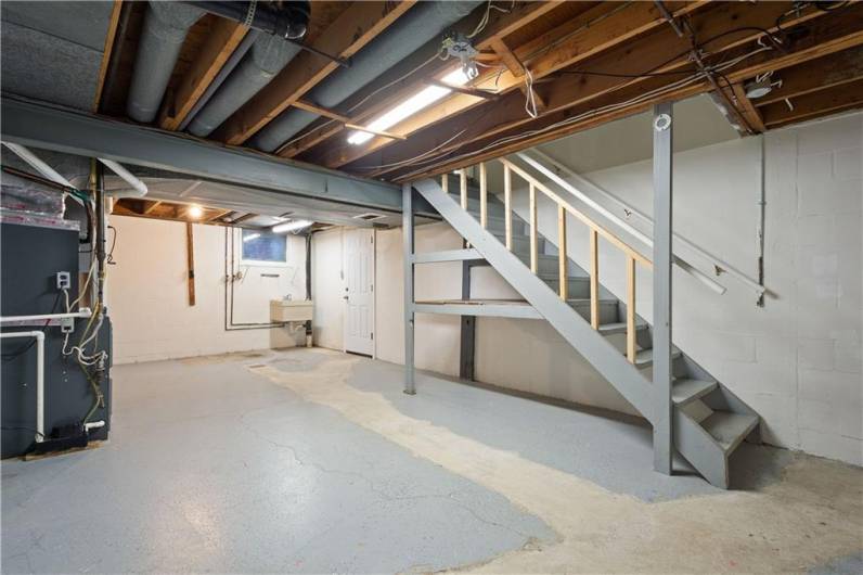 Basement and Laundry Area with access to the 2 car garage.