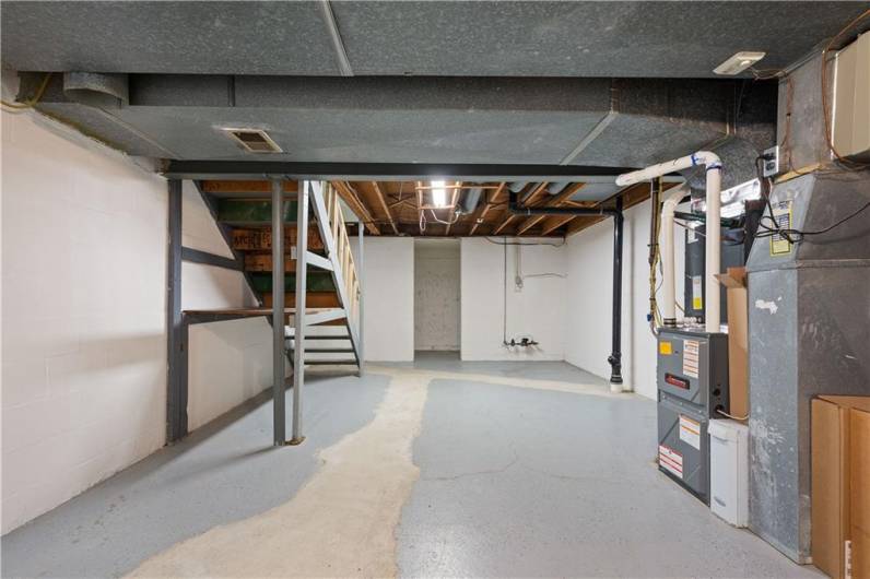 Basement and Laundry Area with access to the 2 car garage.