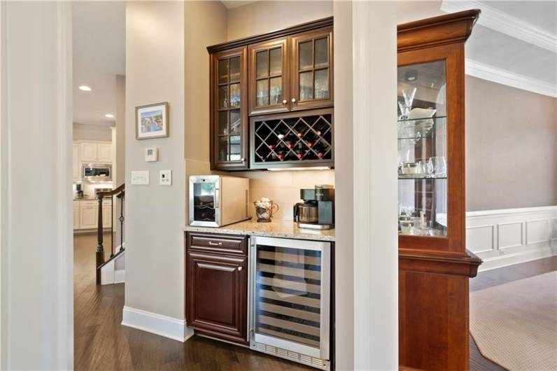 As you pass from the dining to the kitchen you have this great butlers pantry/bar space