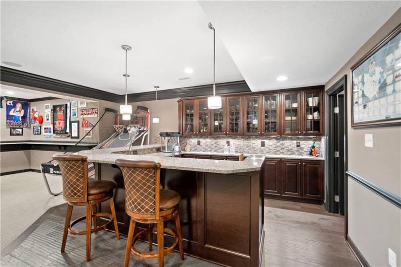 Wet bar, walk-in pantry storage room, Christmas closet, rich dark trim colors...