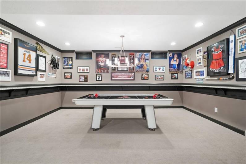 The pool table or air hockey spot w/ beverage rail...