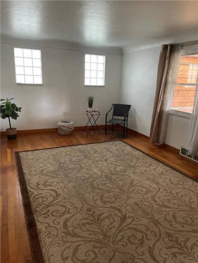 Spacious living room with hardwood floor