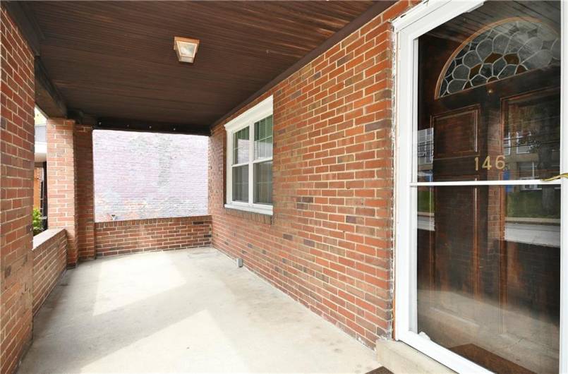 Large covered porch and entry