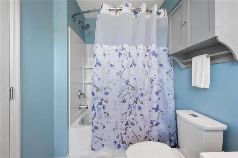 Large tub/shower combination, well updated.