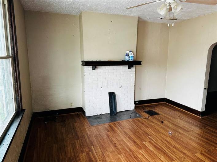 Living Room with Decorative Fireplace