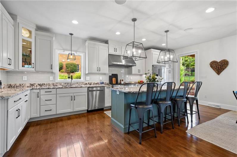 Cabinet and counter space galore, high end appliances, custom light fixtures.