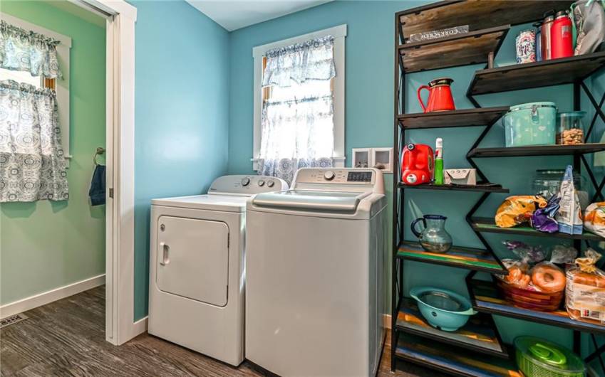 The 2019 Addition provides a Powder Room ~ Laundry Room & Additional Pantry Space (open shelving unit not included)