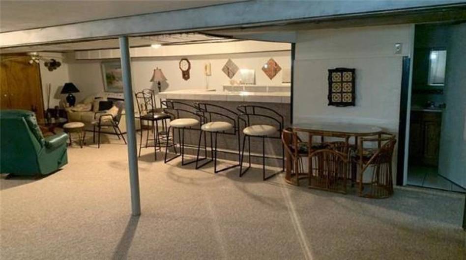 Bar - Basement bar with standing refrigerator included