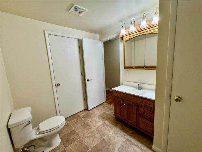 Newer bathroom with linen closet, Services  2 rear bedrooms