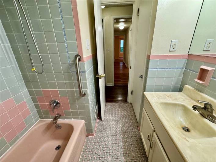 Original ceramic tile bathroom with linen closet