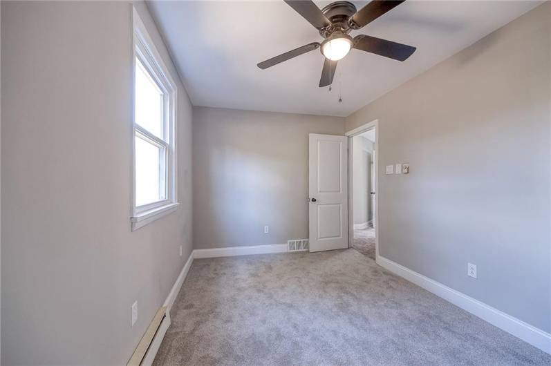 FL 2 BDRM 3 APPROX. SIZE 13'X8'. BASEBOARD HEAT, WALL TO WALL CARPETING, CEILING FAN/LIGHT FOR ADDED COMFORT. LOOKING TO BACK YARD.