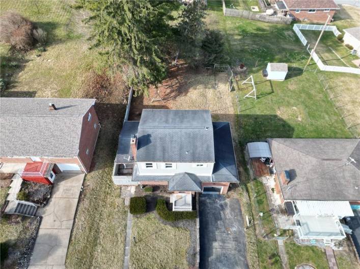 DRONE VIEW OF THE HOUSE AND LOT. THE LOT IS APPROX. 60'X118'.