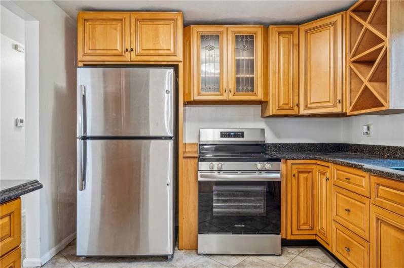 New refrigerator and glass top stove