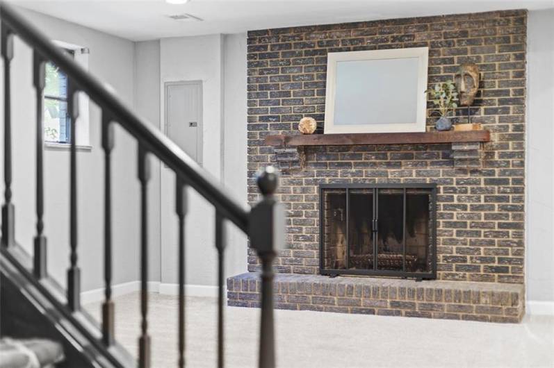 Family room with wood burning fireplace