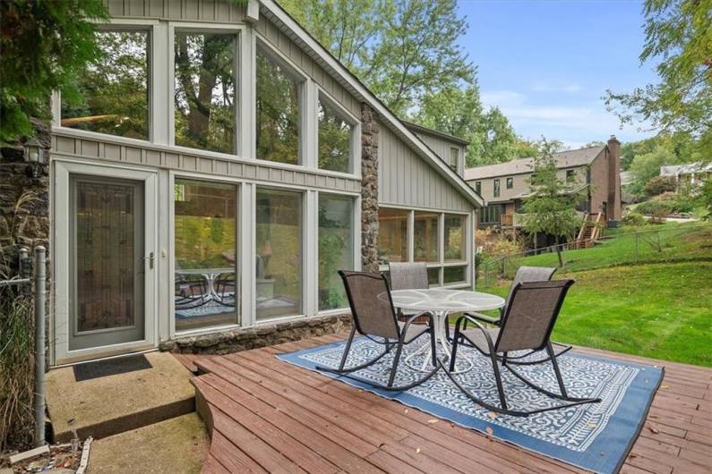 Step outside onto the expansive backyard deck, perfect for outdoor gatherings, with plenty of seating for everyone. Conveniently accessible from both the great room & the laundry room outdoor space is ideal for relaxing, entertaining, or simply enjoying the surrounding nature.