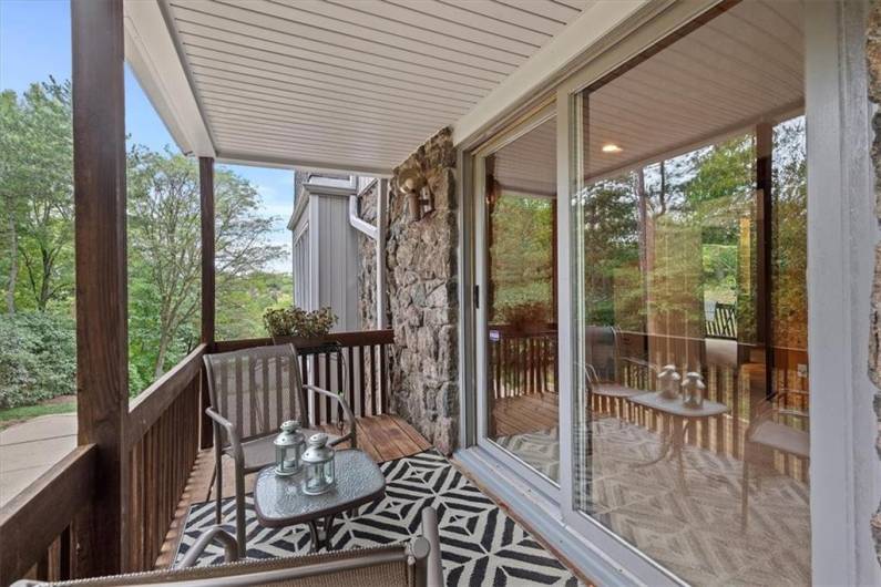 Step through the sliding glass door from the office to a private, covered deck—perfect for savoring your morning coffee or unwinding with a glass of wine in the evening. This versatile outdoor space extends your living area, offering a seamless indoor-outdoor connection, rain or shine.