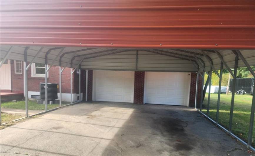 Attached double-car garage with carport.