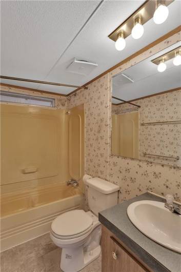 2nd bathroom with soaker tub/shower combo.