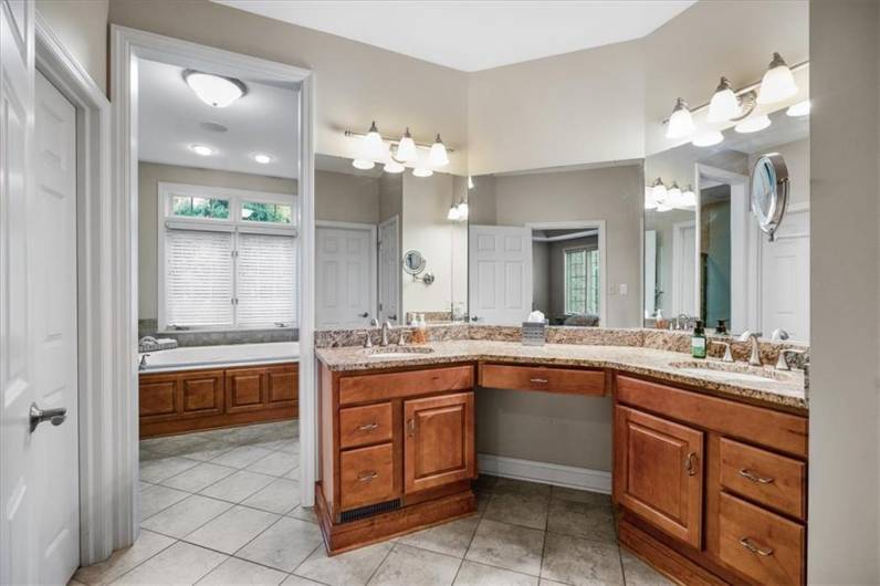 Dual sinks and closets along with linen closet.