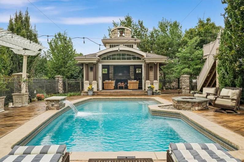 Such a private oasis to enjoy day or night.  The gas fire pit on the right is perfect for cool evenings.