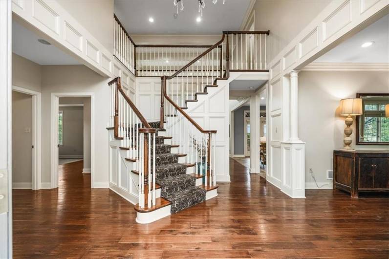 Grand 2 story entry with stunning chandelier.