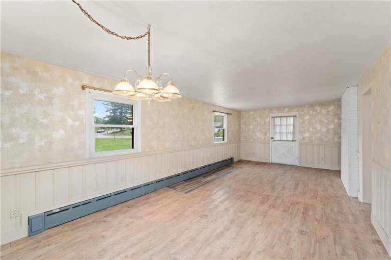 This room has currently been used as a combination formal dining and living room.