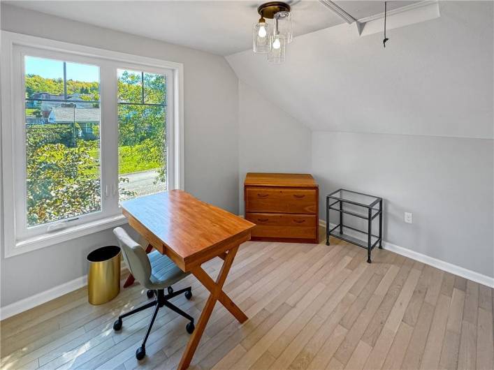 Den/loft on the second floor.  Pull down steps to the attic.