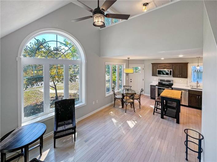 Bright open floor plan with hardwood floors.