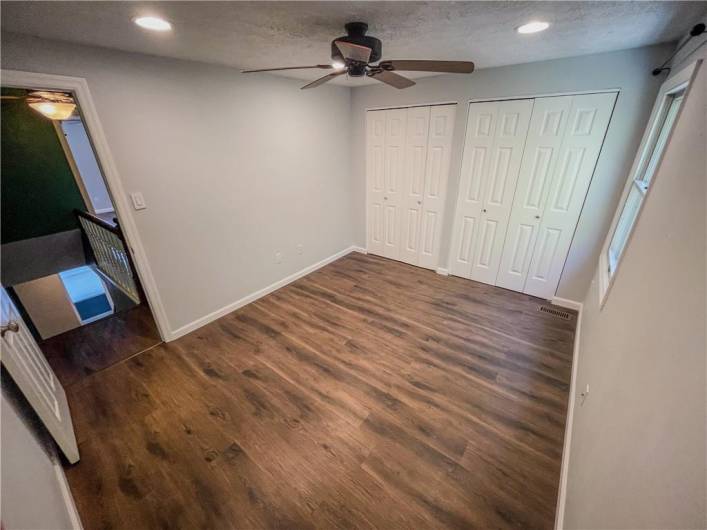 The 2nd bedroom has a wall of closets.