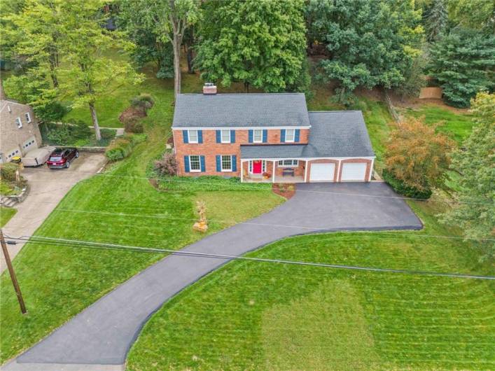 This Home is Nestled on Over a Half Acre of Land with a Fenced Back Yard.