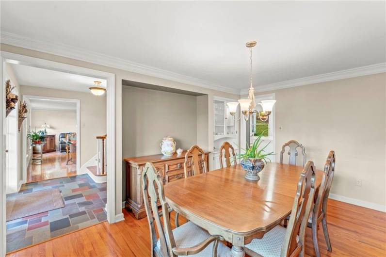 The Formal Dining Room is 15x11 and Carries Over the Original Characteristics of Crown Molding & Baseboards in Addition to a Built-in Fine China Cabinet for Displaying Heirlooms & Treasures