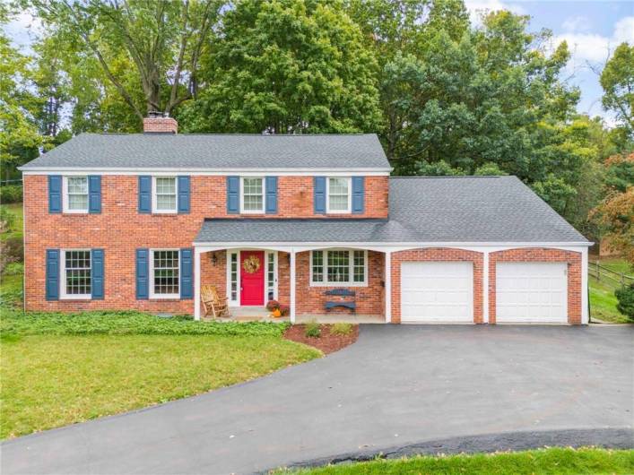 Welcome Home! This All brick Two Story Colonial was Custom Designed to be the Home of the Walsh Family - Founders of Bethel Bakery! The Stately Exterior and Custom Arches Flow Seamlessly From the Front Porch Over to the Original Wooden Double Garage Doors. Freshly Sealed Driveway 10/2024 & New Roof 2021.