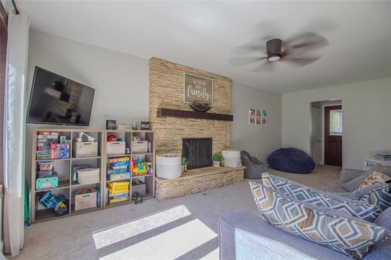 The family room has a rear foyer with closet and powder room with access to the back deck.