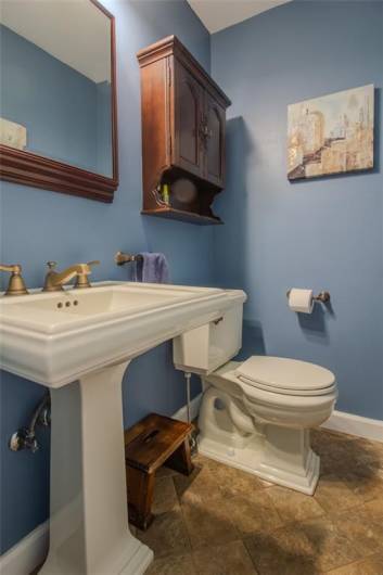 1st floor powder room adjacent to the family room.