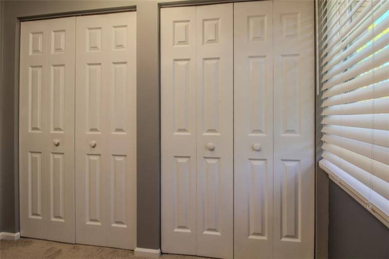 Double closets in primary dressing area.