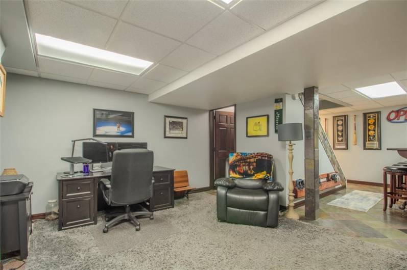 The 28x14 game room area has a viewing protion set up for home theater and game day enjoyment.