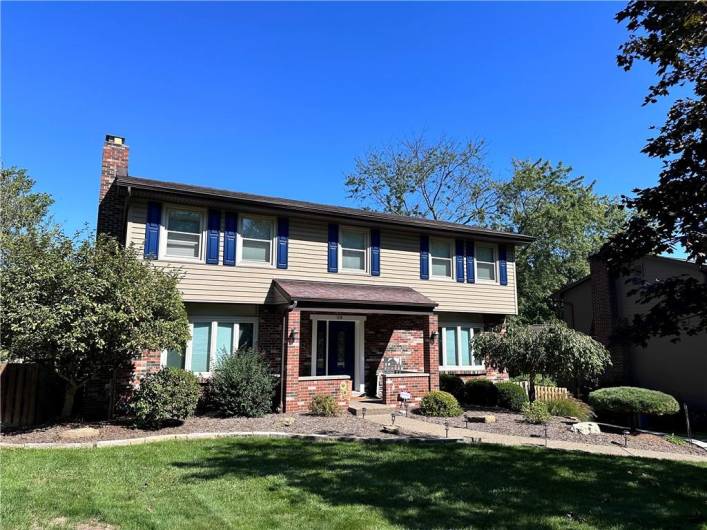 The manicured fenced in lot has extensive exterior living space including the 15x06 covered front porch with exposed aggregate concrete and aggregate sidewalks as well.