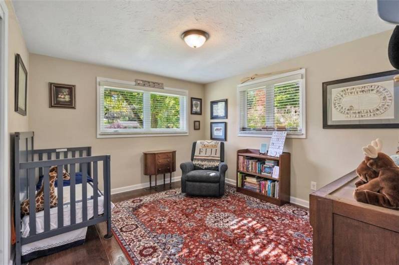 This bedroom is currently being used as a nursery. Yes...more sunshine in this room! Enjoy the beauty of this charming home!  It's what you have been looking for!