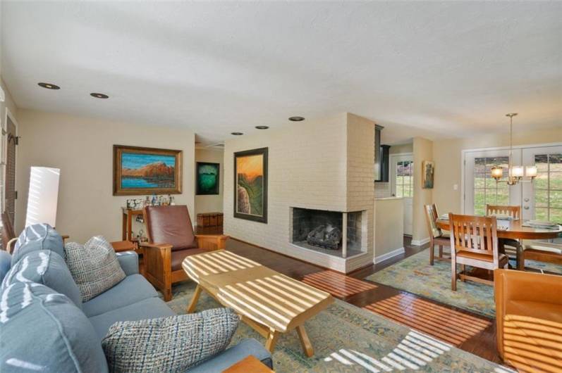 Wonderful living room/dining room combination, with a 2-sided wood burning fireplace.  Just come in and make yourself at home.