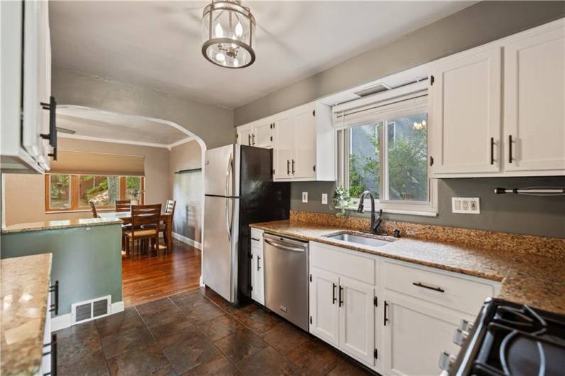 Another View of the Kitchen into the Dining Room.