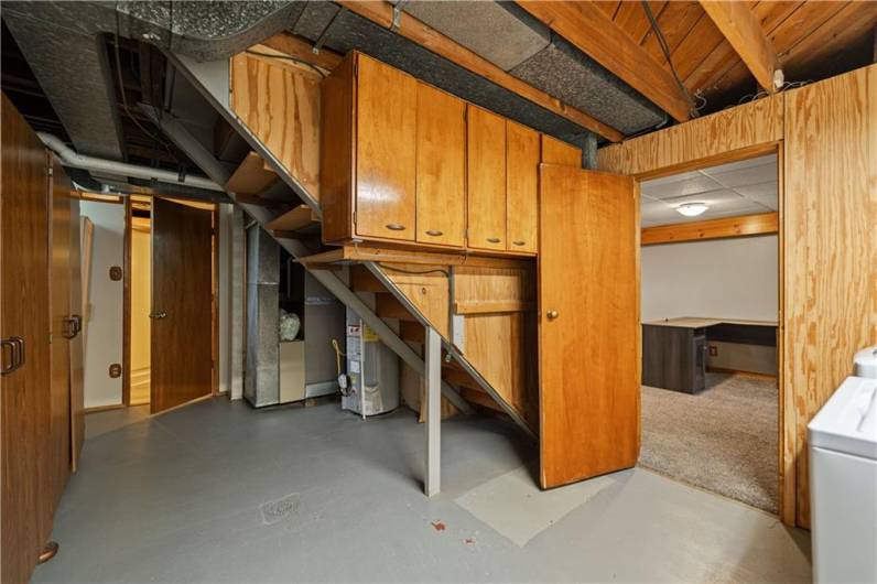 Laundry Area off Family Room in Lower Level with Storage.