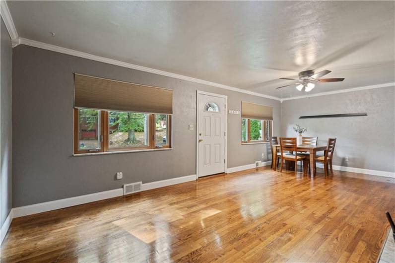 Living Room with Resurfaced Hardwood Floors on the Main Level.