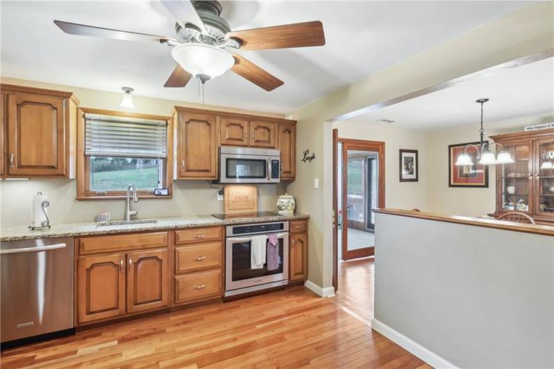 Going back into the main living space, you'll see a bright kitchen, with stainless appliances, and room for a breakfast table for those quick meals.