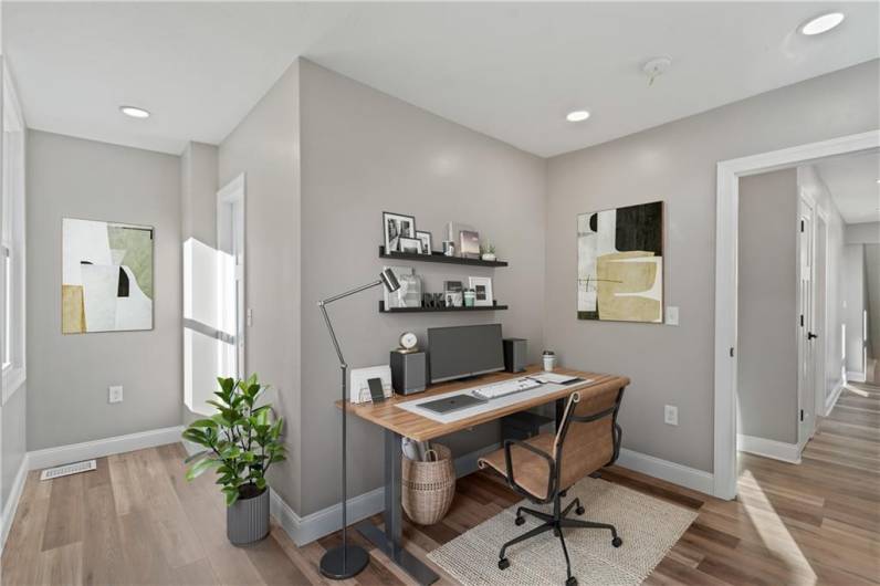 Second floor bedroom that offers versatile uses such as a kids room or home office.