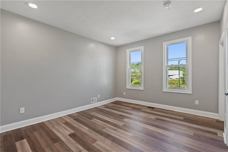 Spacious and comfortable master bedroom that leads to an elegant en-suite with modern finishes.